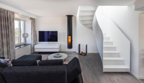 Penthouse am Südstrand - Kamin, Dachterrasse mit Meerblick und Gasgrill, Klimaanlage, Luxus-Design-Apartment, 2 Minuten zum Strand